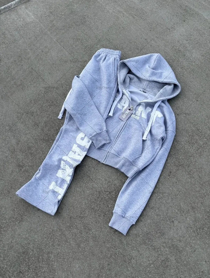 Nuevo traje de streetwear hip-hop para hombres, chándal casual retro con estampado de letras, sudadera con cremallera gris Harajuku para mujeres